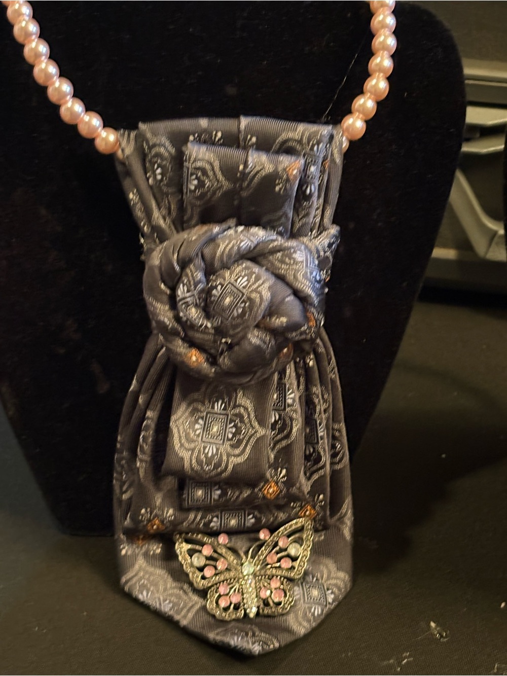 Gray Satin Floral necktie Necklace with Pink and silver butterfly brooch.